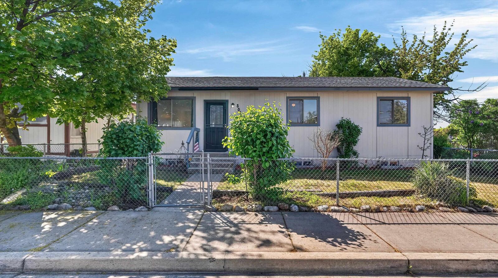 Property Photo:  5012 E Commerce Ave  WA 99206 