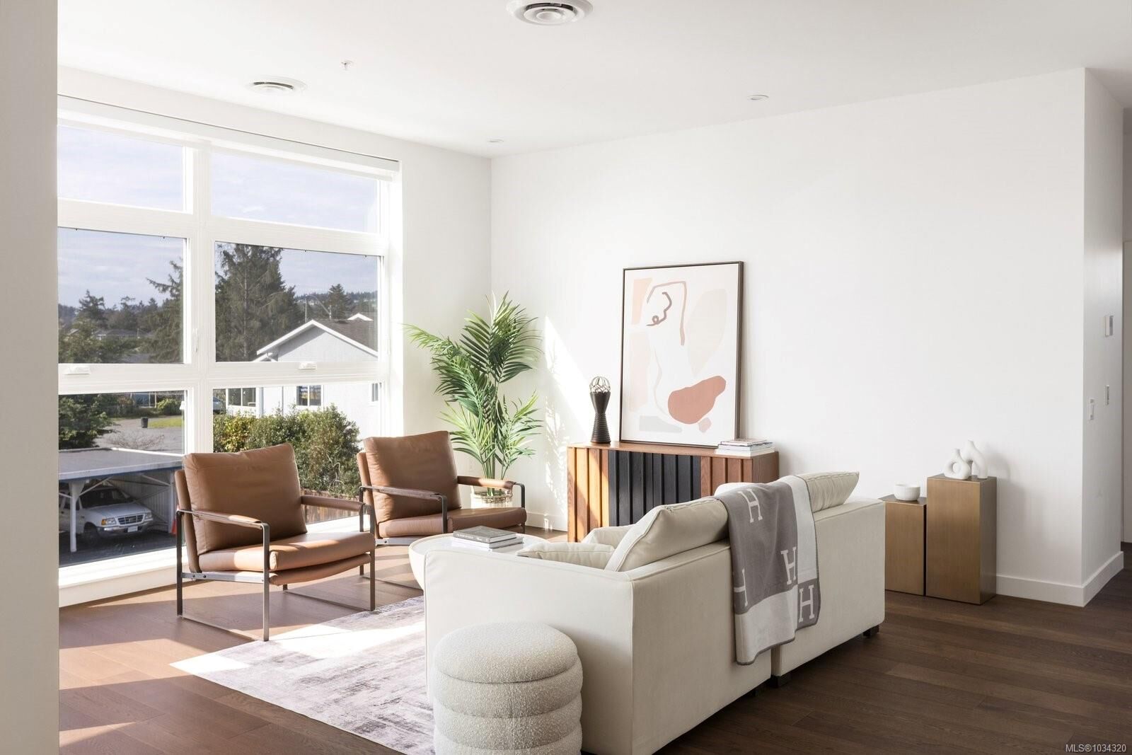 Property Photo:  9570 Fifth St 108  BC V8L 2W5 