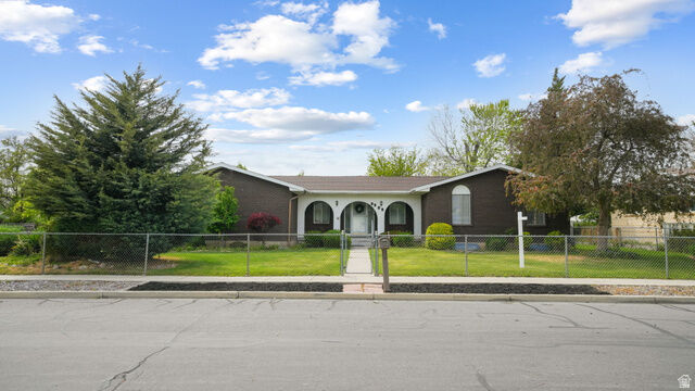 Property Photo:  9556 S David St E  UT 84070 