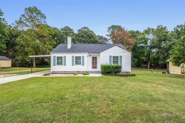Property Photo:  111 Poplar Street  GA 30213 