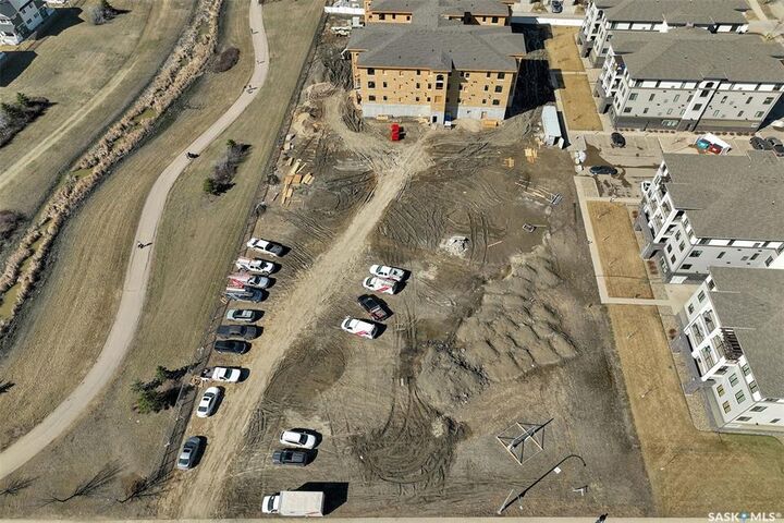 Property Photo: 4594 Harbour Landing Drive 203 SK S4W 0R8