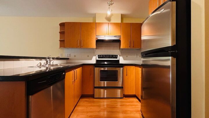 Property Photo:  3388 Morrey Court 409  BC V3J 7Y5 