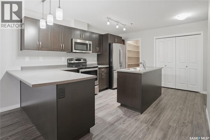 Property Photo:  201 2452 Killdeer Drive  SK S9A 3T5 
