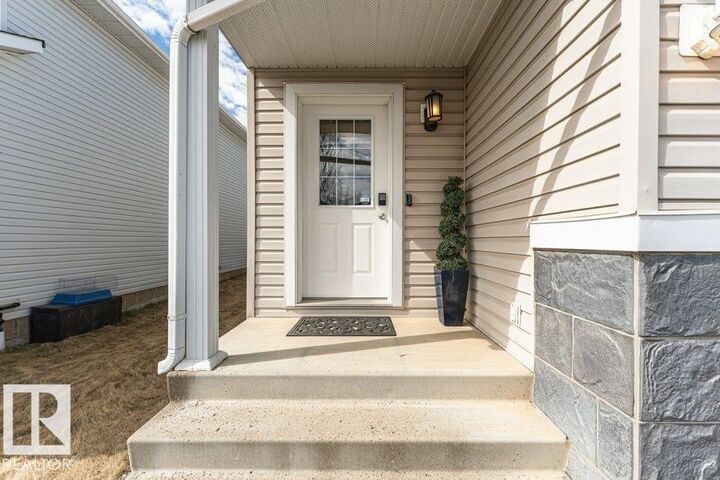 Property Photo:  13806 38 Street NW  AB T5Y 3G6 
