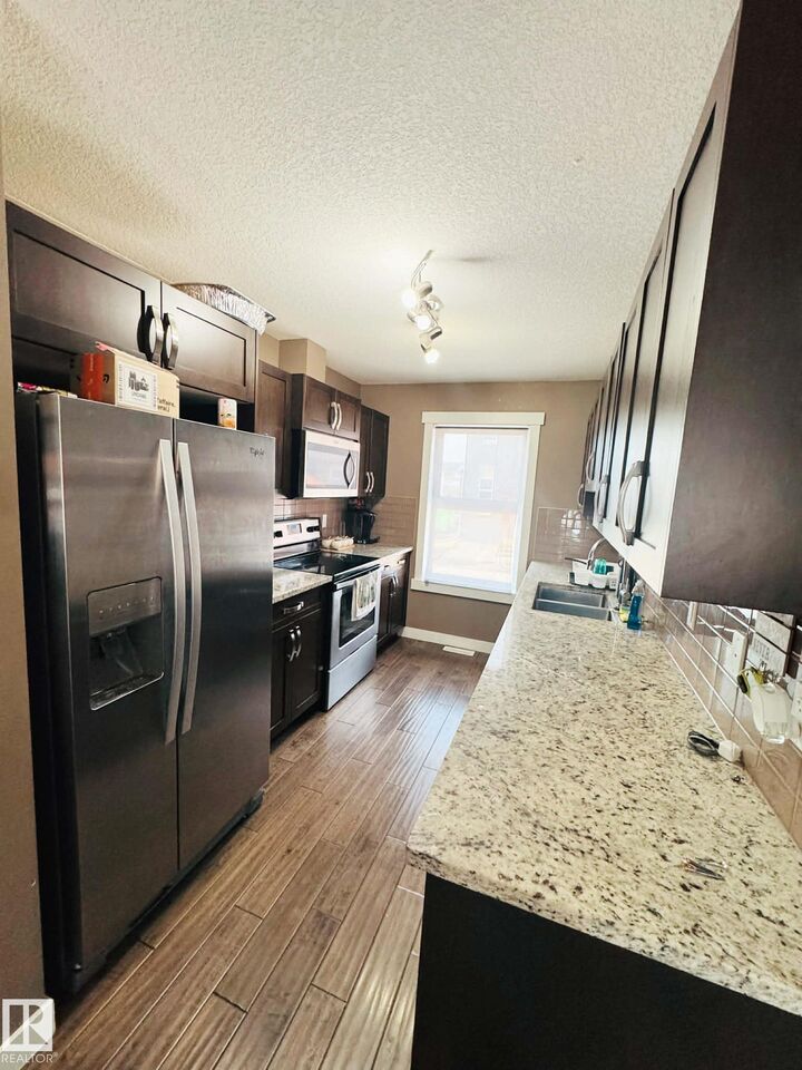 Property Photo:  401 Southfork Drive 311  AB T9E 0X1 