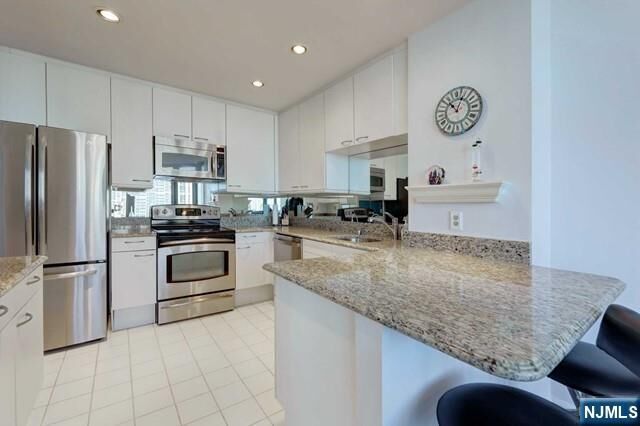 Property Photo:  100 Carlyle Drive 17B-N  NJ 07010 