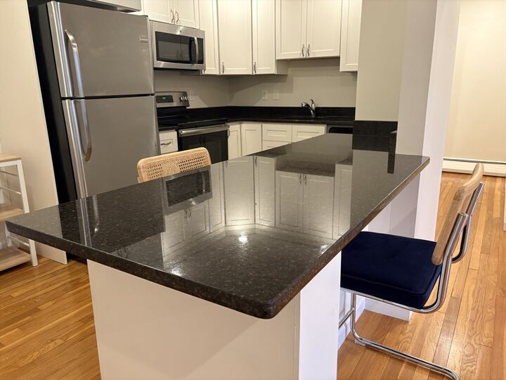 Property Photo:  8 Riverside Street 1-2  MA 02472 