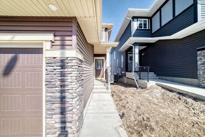 Property Photo:  287 Amblehurst Way NW  AB T3P 2J8 