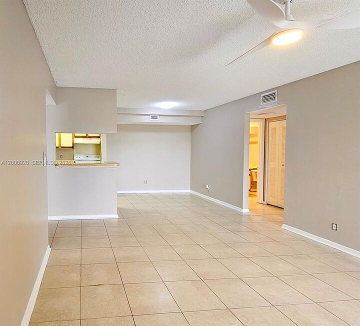 Property Photo:  5654 Rock Island Rd 227  FL 33319 