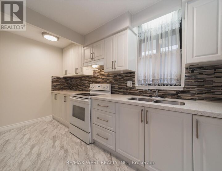 Property Photo:  50 Old Kingston Road 1-202  ON M1E 4Y1 