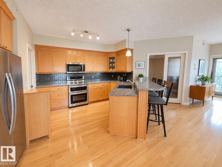 Property Photo:  9803 96A Street NW 301  AB T6A 4A5 