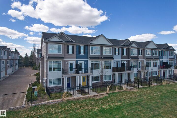 Property Photo:  11373 12 Avenue NW 6  AB T6J 5V2 