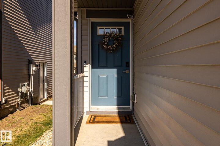 Property Photo:  1440 Darby Green SW  AB T6W 4N5 