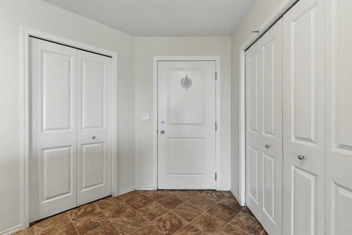 Property Photo: 15 Saddlestone Way NE 409 AB T3J 0S3