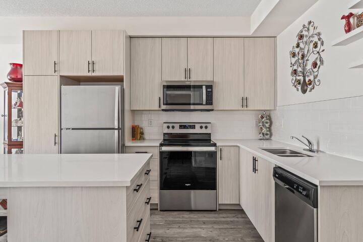 Property Photo:  151 Legacy Main Street SE 6302  AB T2X 4A4 