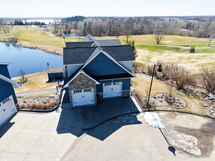 Property Photo:  25054 South Pine Lake Road 4030  AB T0M 1R0 