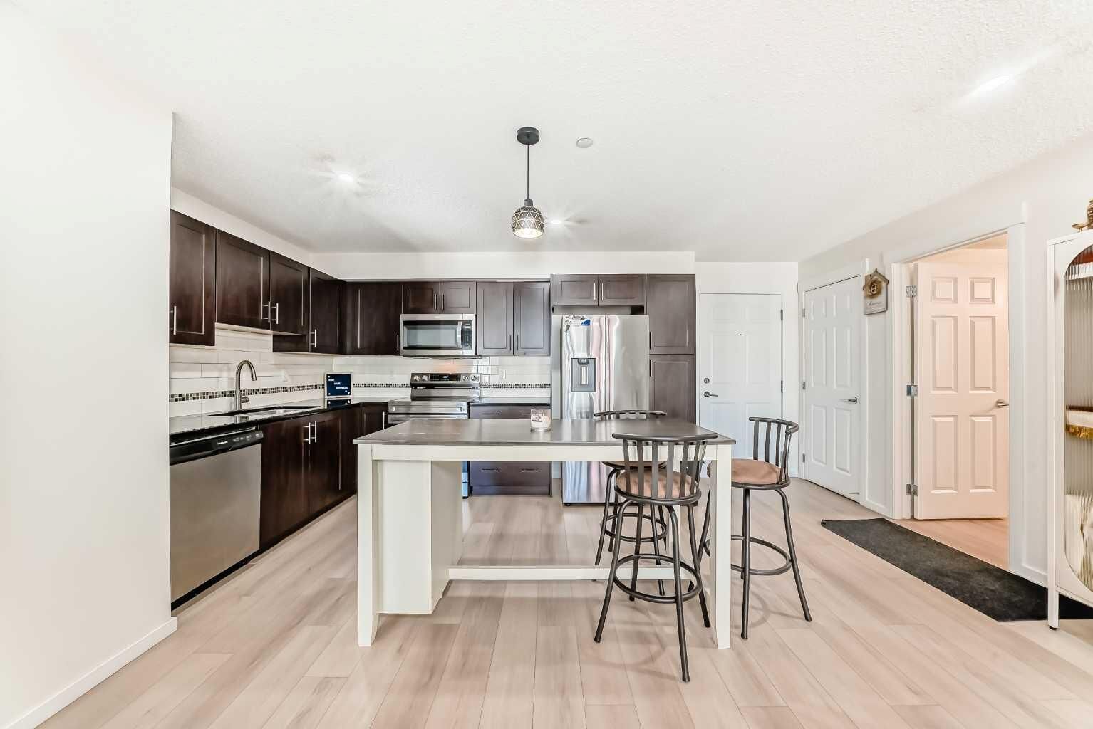 Property Photo:  755 Copperpond Boulevard SE 1312  AB T2Z 4R2 