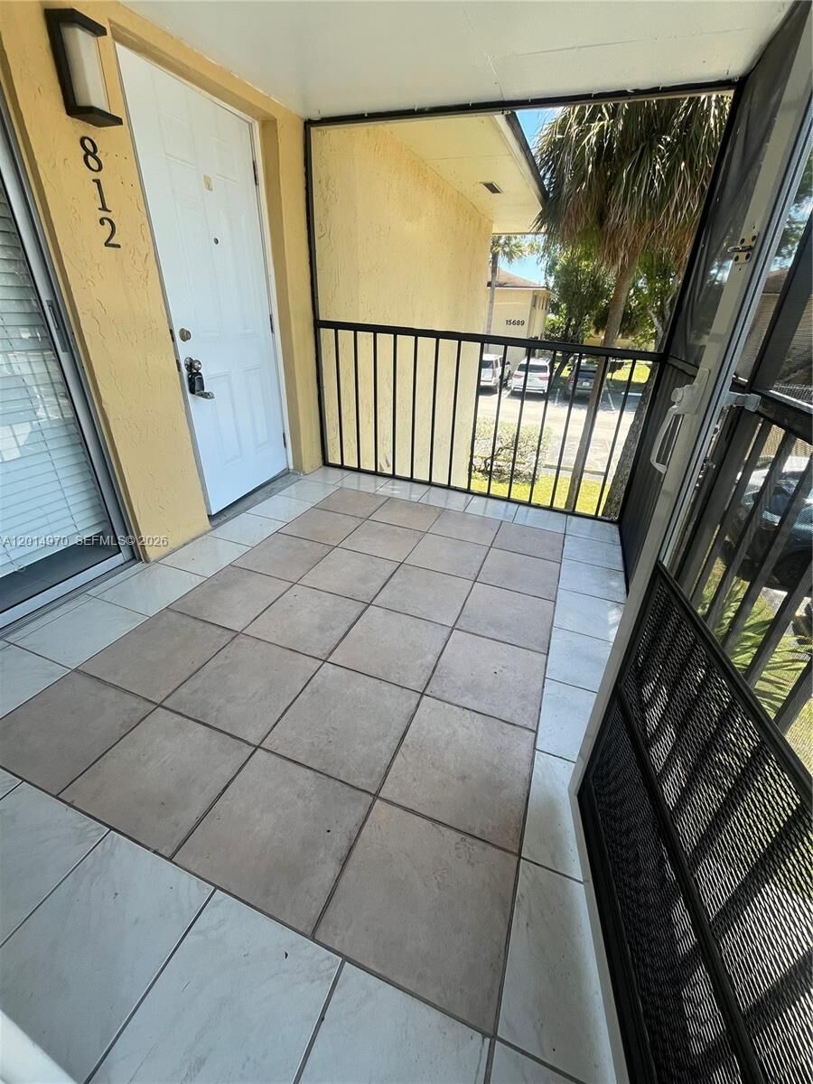 Property Photo:  15609 SW 73rd Cir Ter 8-12  FL 33193 