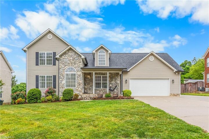 Property Photo:  203 Naola Court  NC 27263 