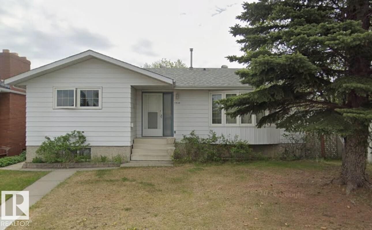 Property Photo:  11035 166 Avenue NW  AB T5X 1Y2 