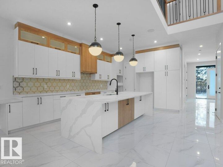 Property Photo:  6129 Crawford Drive SW  AB T6W 4L8 
