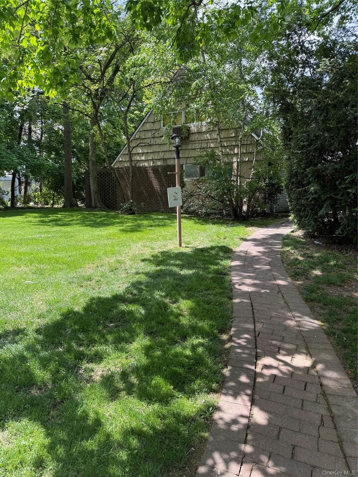 Property Photo:  2 Hemlock Lane  NY 11577 