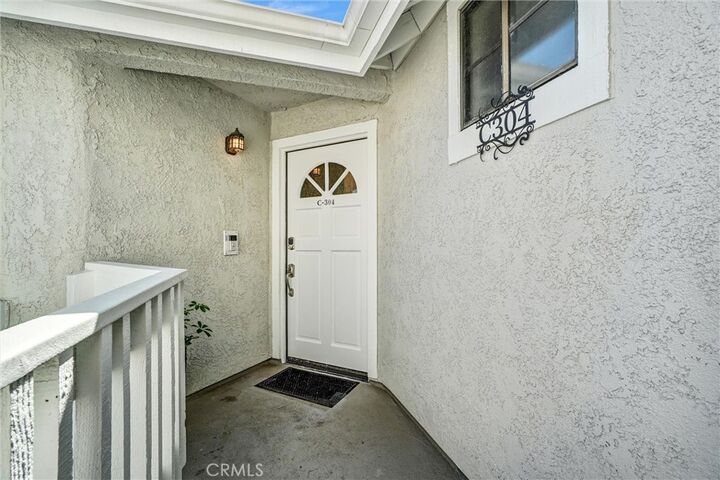 Property Photo:  4682 Warner Avenue C304  CA 92649 