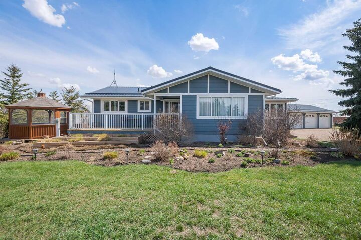Property Photo:  274048 Rge Rd 261  AB T0M 0G0 