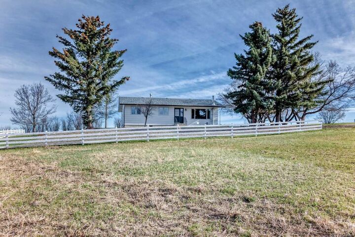 Property Photo:  302064 Range Road  AB T0M 1J0 