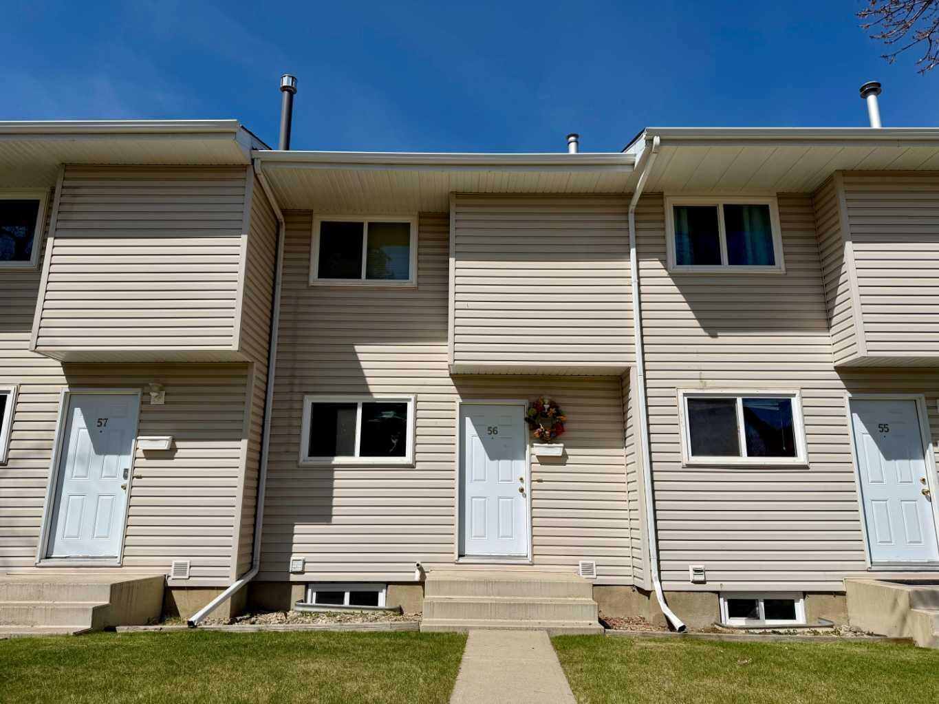Property Photo:  55 Lemoyne Crescent W 56  AB T1K 4J7 