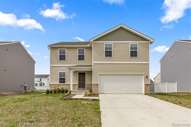 Property Photo:  9053 Sandstone Drive  MI 48166 
