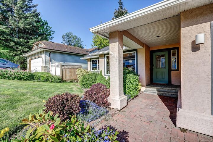 Property Photo:  5811 Tweedsmuir Cres  BC V9T 5Y6 