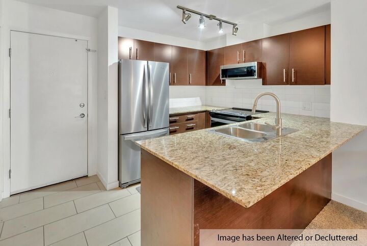 Property Photo:  11665 Haney Bypass 309  BC V2X 8W9 