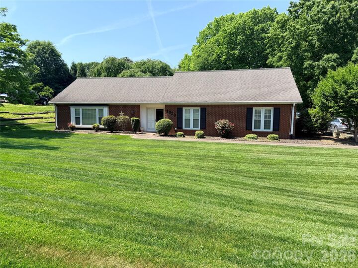 Property Photo:  1020 Longreen Drive 50A  NC 27284 