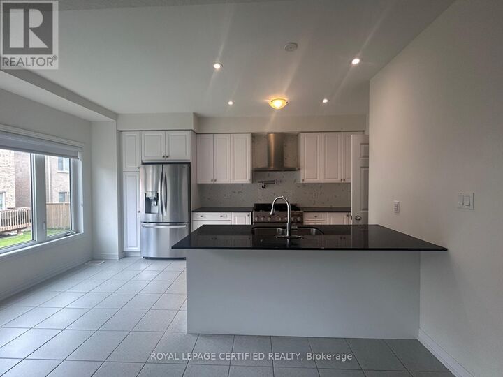 Property Photo:  3948 Thomas Alton Boulevard  ON L7M 2A4 