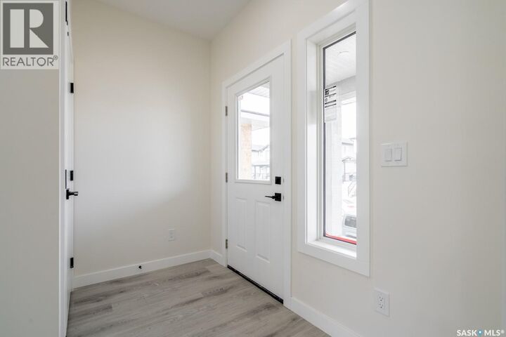 Property Photo:  1142 Poley Street N  SK S4R 8H3 