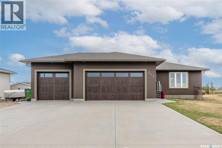 Property Photo:  212 Iron Bridge Drive  SK S6J 0B5 