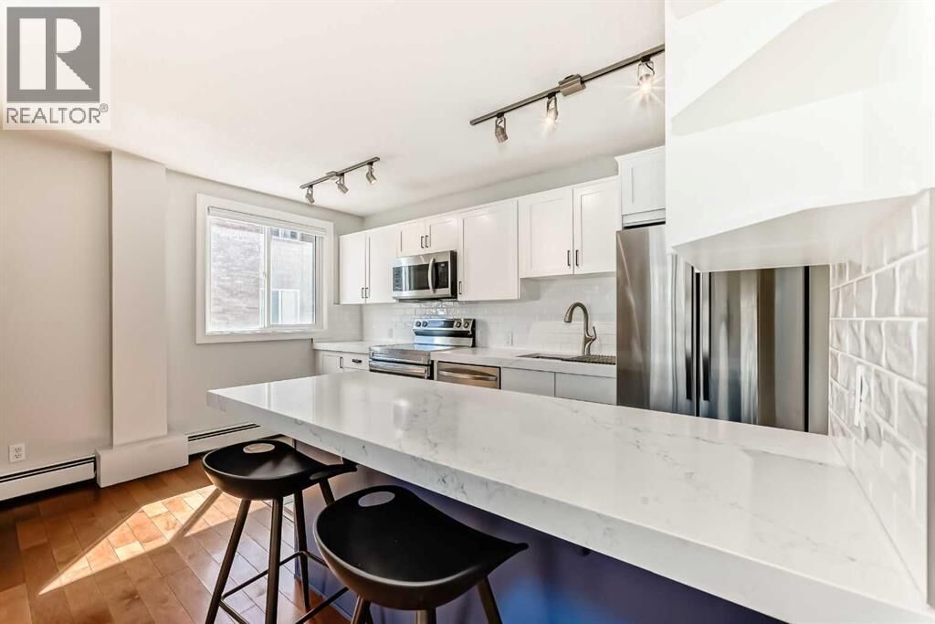 Property Photo:  835 18 Avenue Southwest  AB T2T 0G9 