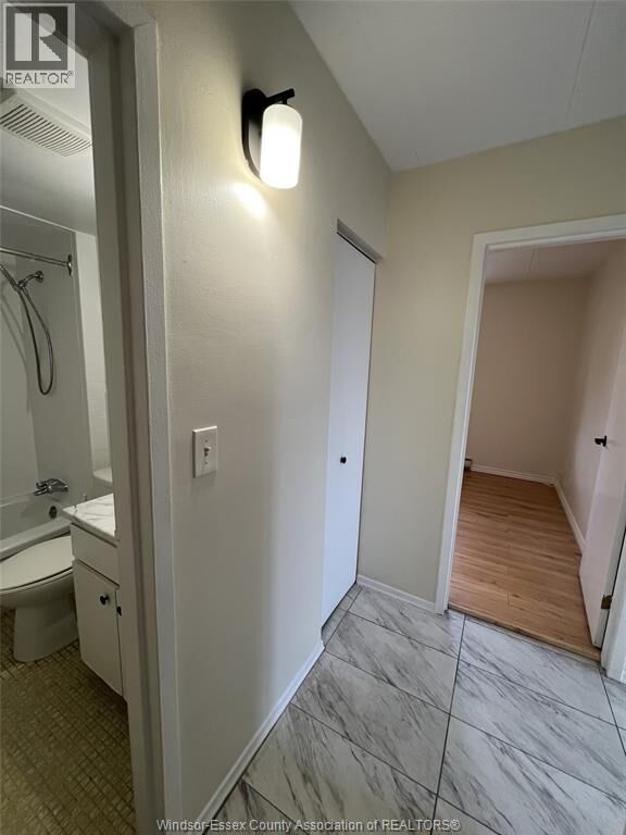 Property Photo:  1580 Moy Avenue 201  ON N8X 4S9 