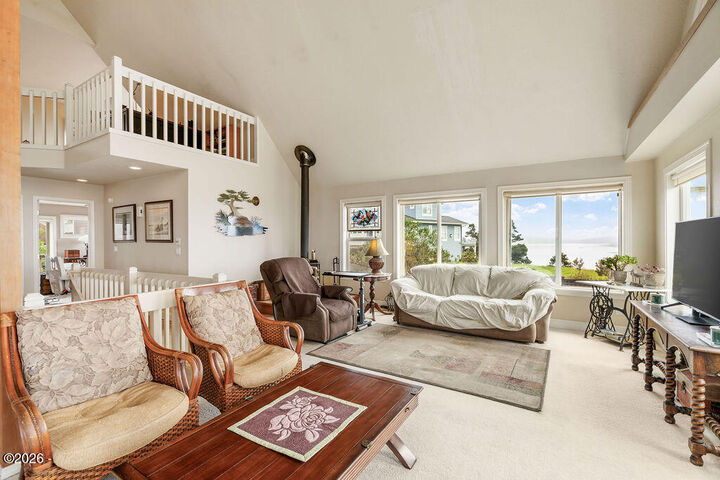 Property Photo:  4912 SW Beach Avenue  OR 97367 