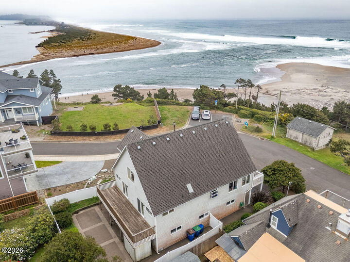 Property Photo:  4912 SW Beach Avenue  OR 97367 