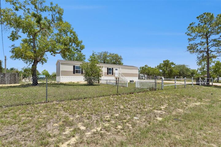 Property Photo:  2861 Fast Trot Trail  FL 33898 