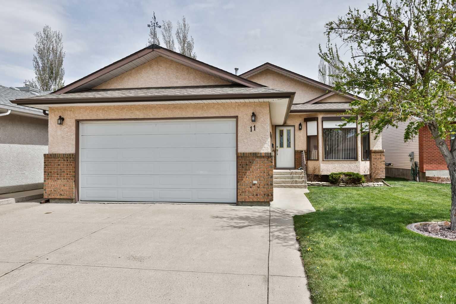 Property Photo:  11 Cougar Road N  AB T1H 6H3 