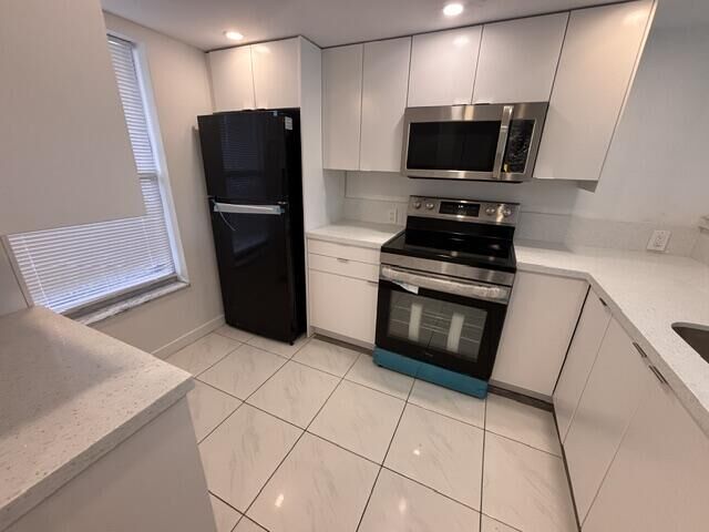 Property Photo:  6051 NW 61st Avenue 103  FL 33319 