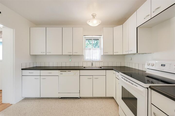 Property Photo:  2765 Fernwood Rd  BC V8T 3A3 