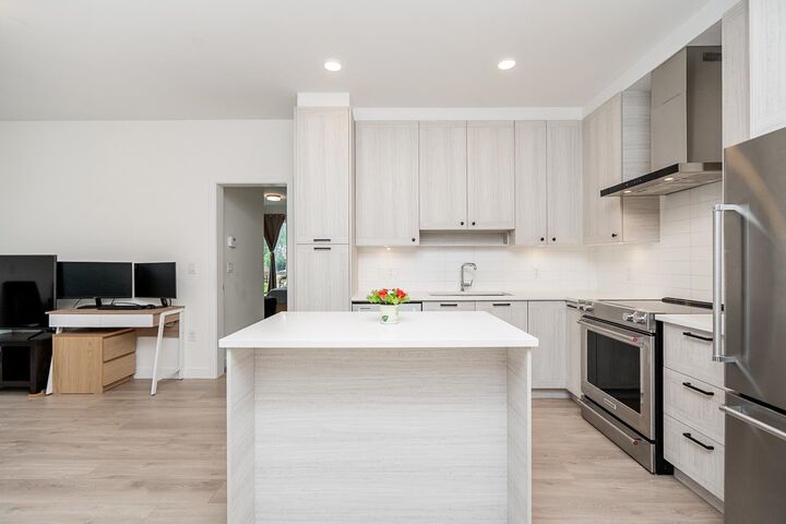 Property Photo:  7133 14th Avenue 102  BC V3N 0H5 