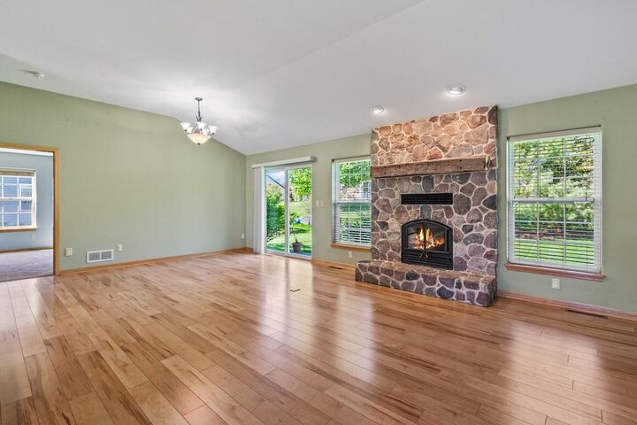 Property Photo:  1280 Wrenfield Way  WI 53066 