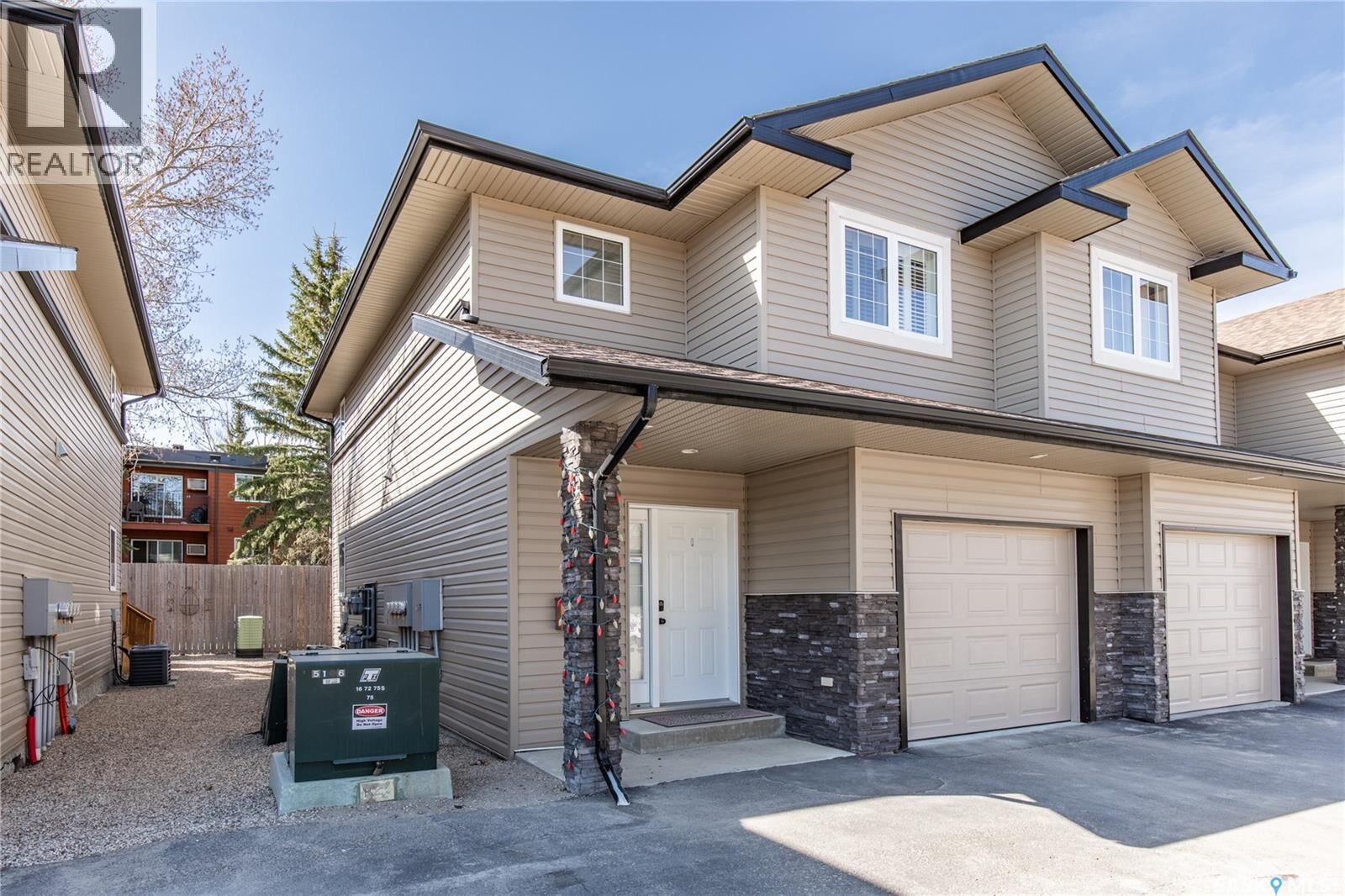 Property Photo:  B4 33 Wood Lily Drive  SK S6J 1E6 