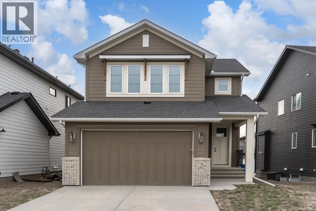 Property Photo:  313 Grayling Manor  AB T3Z 0H6 