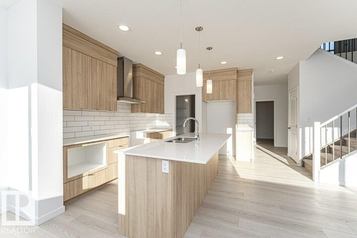 Property Photo: 2312 160 Street SW AB T6W 5X2